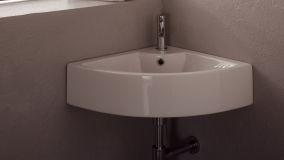 Una soluzione per il bagno stretto: il lavabo ad angolo