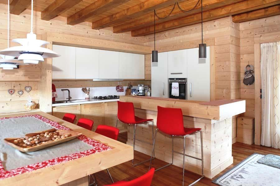 Zona cucina open space in legno, di DGM Arredi
