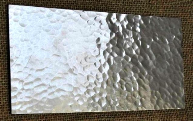Piastrella in metallo per rivestimento parete, di Giara