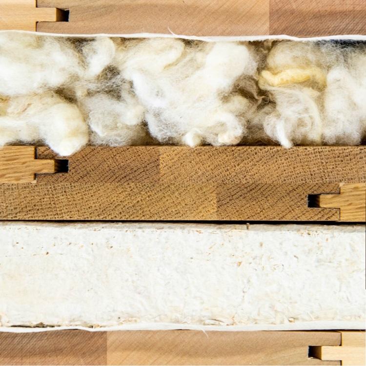 Pannelli isolanti per porte realizzate con miceli o lana di pecora