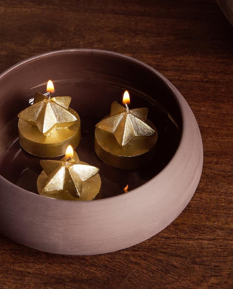 Collezione natalizia Zara Home: candele a forma di stella