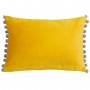 Il cuscino giallo con pompon