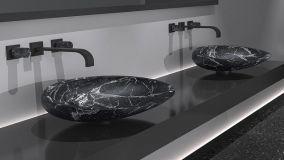 Idee per realizzare un raffinato bagno in marmo nero