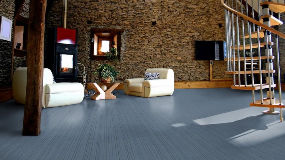 Salotto realizzato con pavimento flotex, linea pinstripe di Linoleum Italia