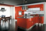Cucina in colore arancione, soluzione Creo e Lube