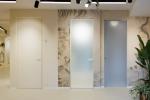 Showroom Eclisse a Napoli: syntesis vetro, battente e scorrevole