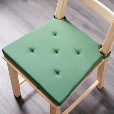 Cuscino con strappi verde per sedie Justina di Ikea