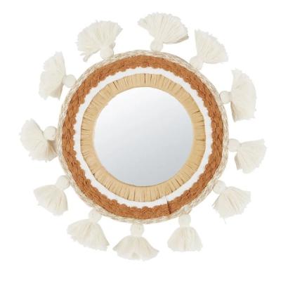 Specchio rotondo con pon-pon - Foto: Maisons du Monde