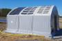 Tendone fotovoltaico montato su struttura per realizzare piccolo deposito materiale energetizzato autonomamente