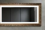 Ruke specchio con cornice lavorata color oro scurito