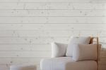 Decorare le pareti del soggiorno con i listoni in legno - Foto: Unsplash