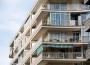 Il divisorio posto tra due balconi di proprietà diverse va inteso come parte comune del condominio o dell'edificio