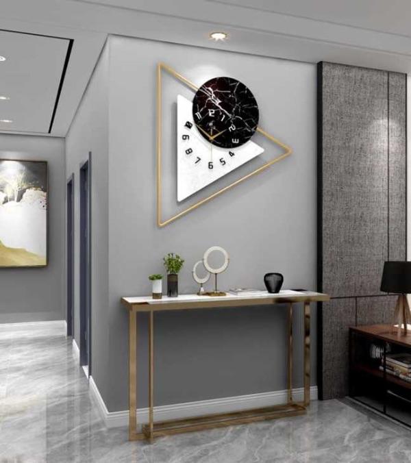 Orologio da parete moderno: 6 modelli per un soggiorno open space