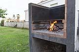 Barbecue in mutatura con mattoni refrattari 
