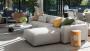 Arredare un appartamento per affitti brevi: divano modulare - Fonte foto: R-Architecture, Unsplash