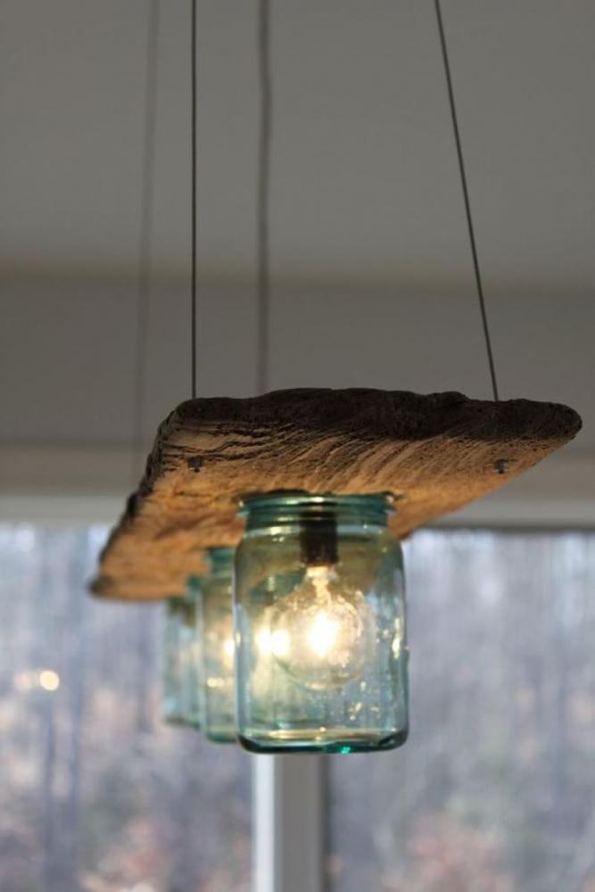 Barattoli usati per lampadario. Foto da Pinterest