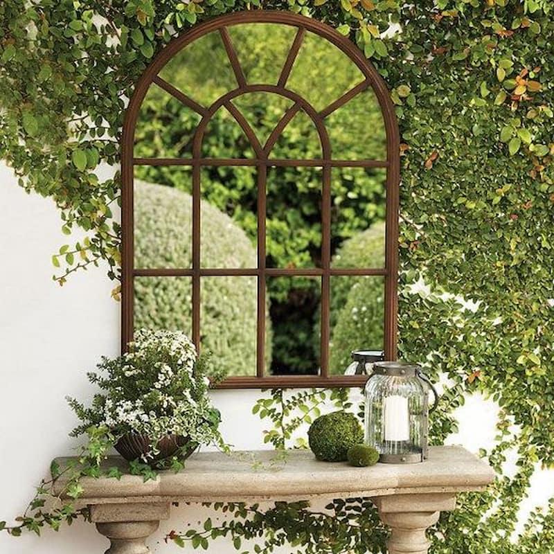 Specchio da giardino su mensola, foto da Pinterest