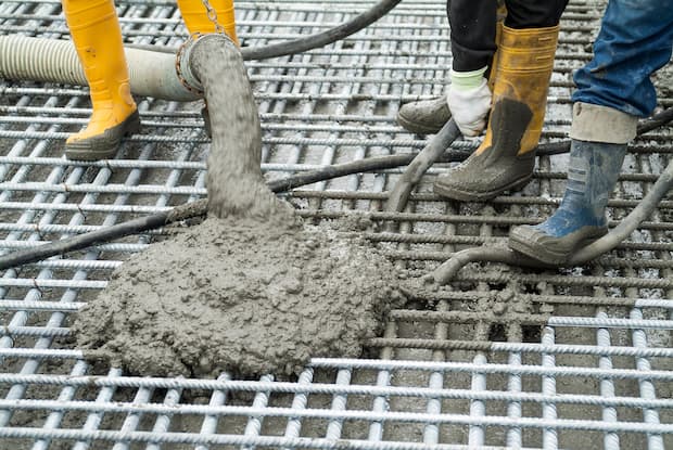 Fluid concrete being poured - Getty Images