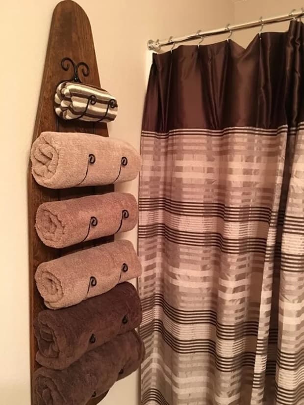 Bathroom shelf with ironing board, from Pinterest 