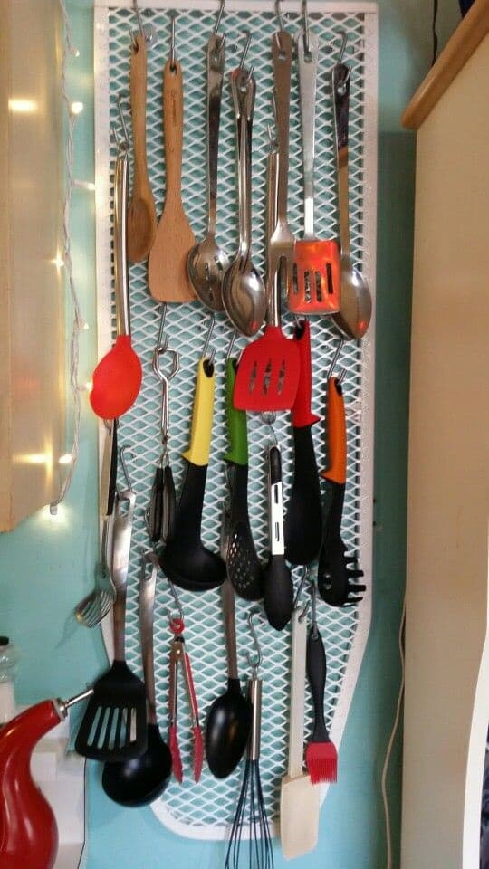 Kitchen organizer with recycled ironing board, from Pinterest 