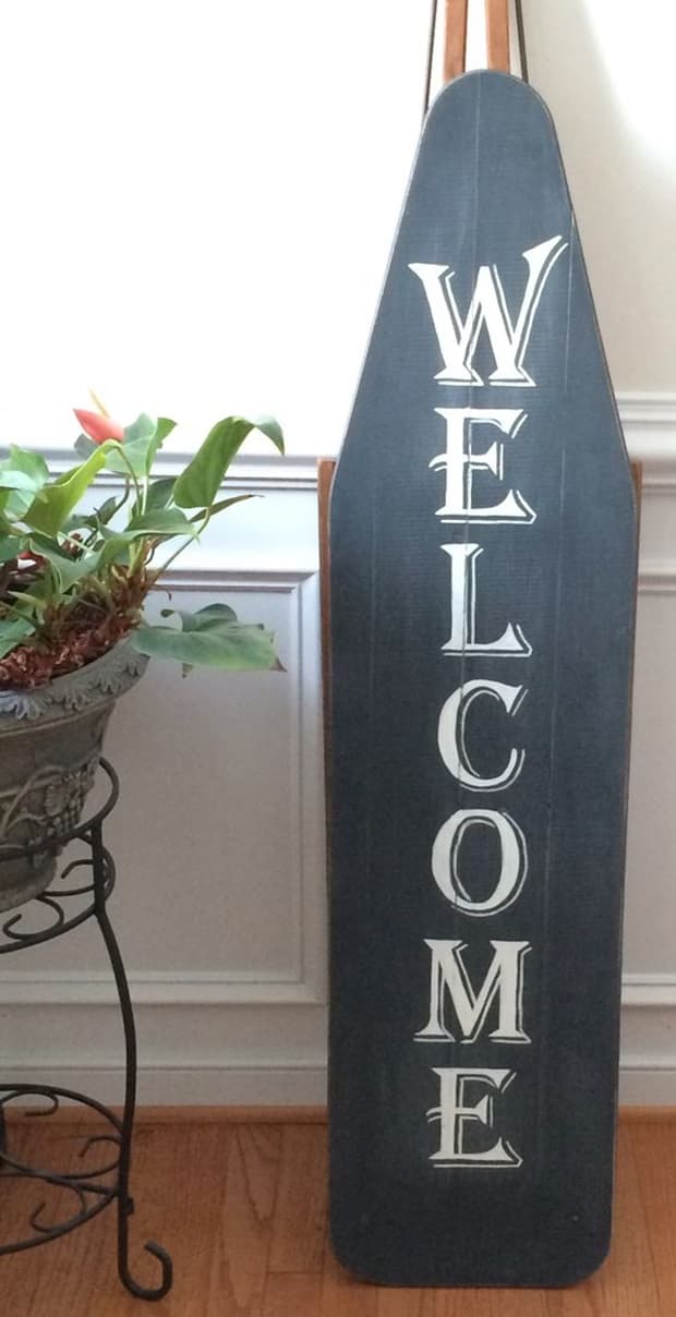 Welcome sign with ironing board, from Pinterest 