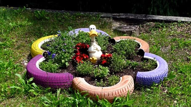 Recycle tires to make a flowerbed, from lushome.com 