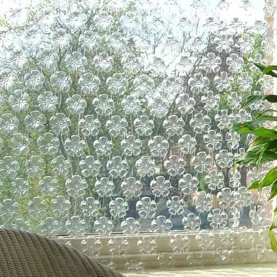 Divider with plastic bottles, from bioarchit.wordpress.com