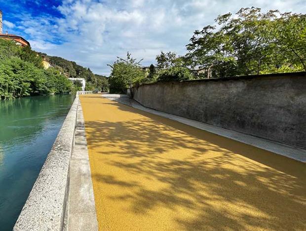 Yellow asphalt cycle path, by CORECOM