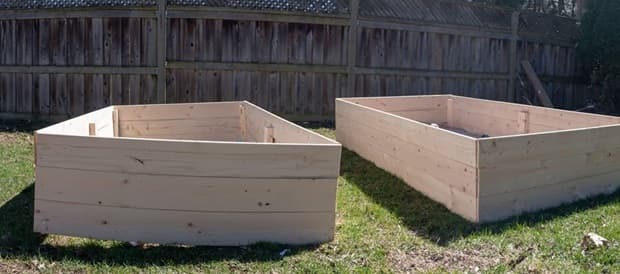 Raised vegetable garden with wooden pallets from Getty Images