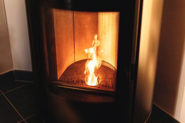 Pellet stove lit - photo Getty Images