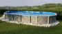 Piscina con rivestimento effetto pietra - foto Magic Garden