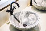 Lavabo da appoggio effetto pietra - foto freepik
