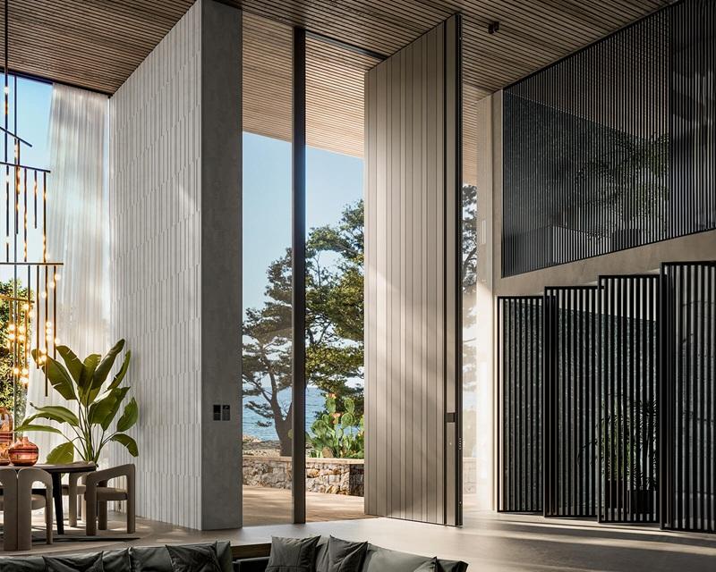 La porta pivot blindata Synua di Oikos