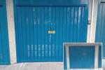 Porta garage basculante - foto officine locati