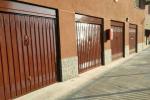 Porte garage in contesto condominiale - foto officine locati