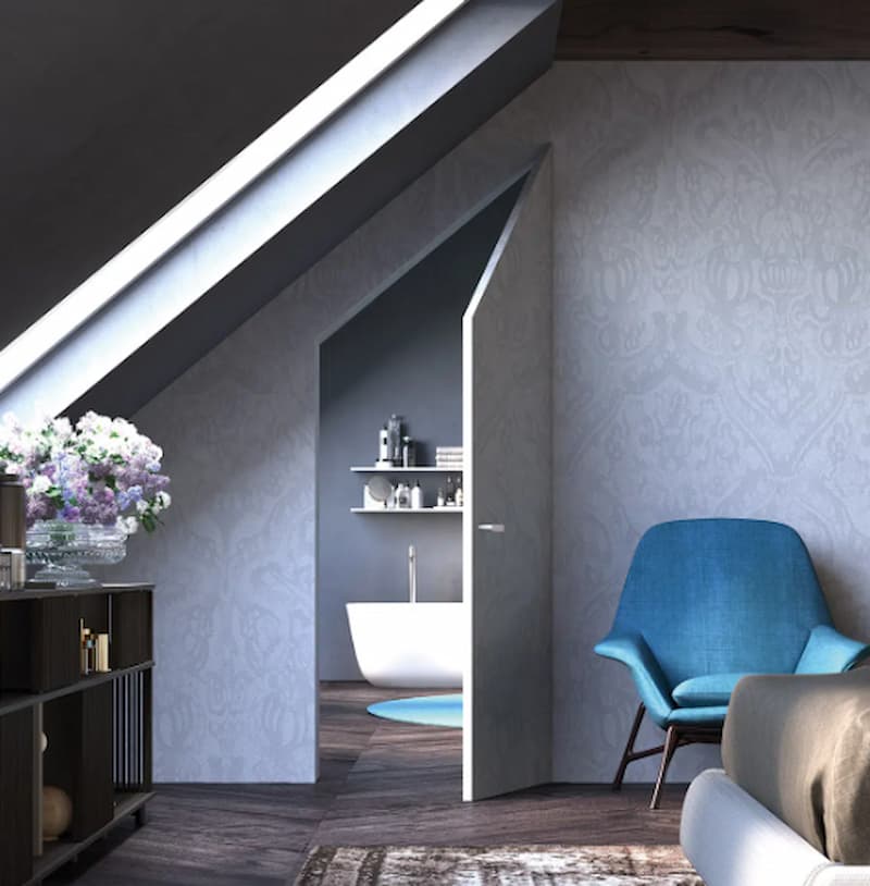 Porta perfettamente mimetizzata nella parete - foto Eclisse srl