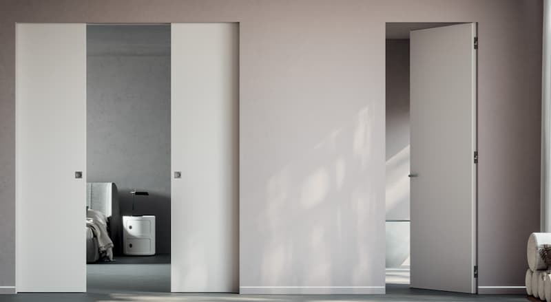 Porte filo muro scorrevole e a battente