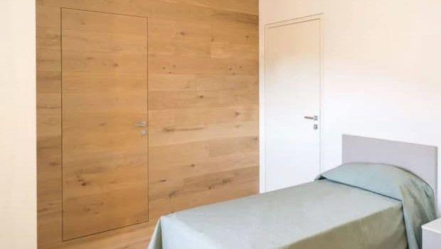 Porte interne filo muro: come influenzano la gestione degli ambienti nel tempo