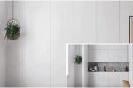 Sportelli filo muro per nascondere cucina a vista - foto eclisse