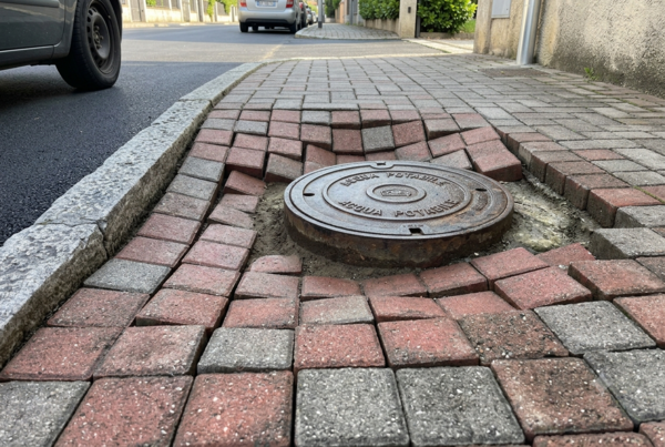 Cedimento del pavimento su tombino
