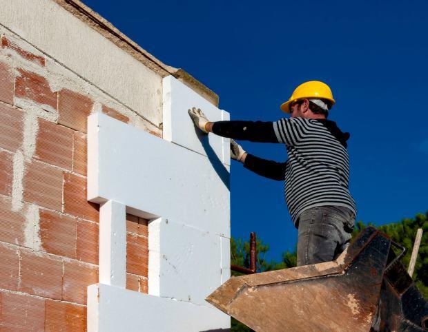 Posa cappotto termico su rdificio in muratura 