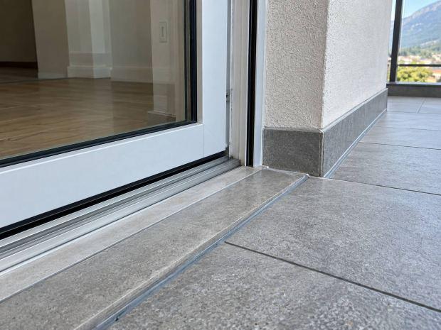Raccordo tra terrazzo e casa