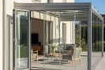 Chiusura della veranda e continuità con il soggiorno - foto infissi de.ma