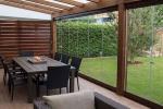 Veranda in legno con chiusura laterale vetrata - foto verande lombardia